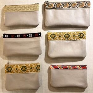 pochettes zippées en cuir et galon vintage